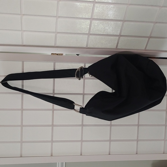 DKNY Black Crossbody Bag with Adjustable Strap and Slouchy Design - Picture 15 of 16